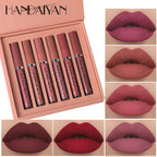 Makeup liquid lipstick set with six shades displayed in a box, shown on lips.