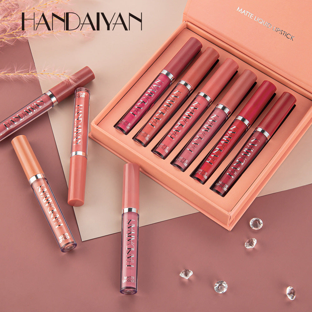 Set of HANDAIYAN lipsticks with a box on a beige background