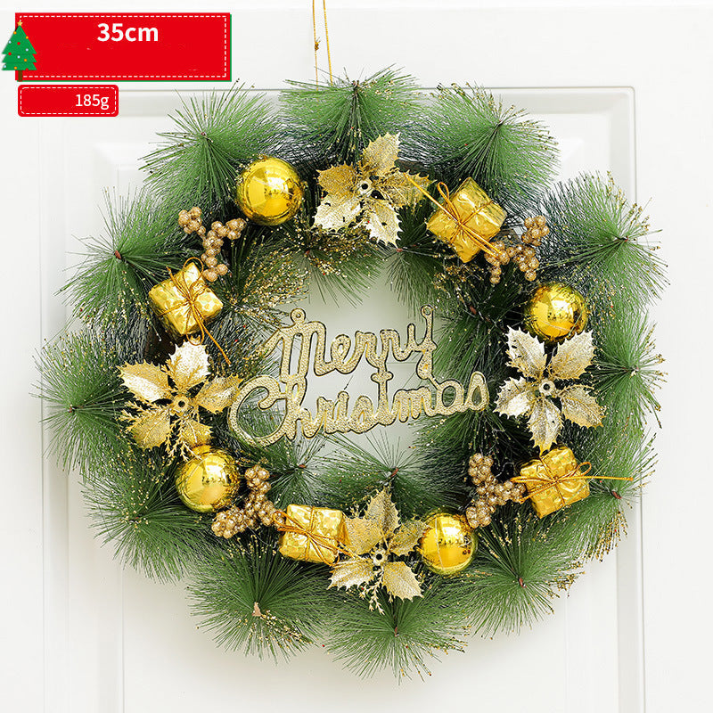 Christmas wreath with gold decorations and 'Merry Christmas' text on a white background
