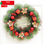 Christmas wreath with decorative elements and 'Merry Christmas' text on a white background