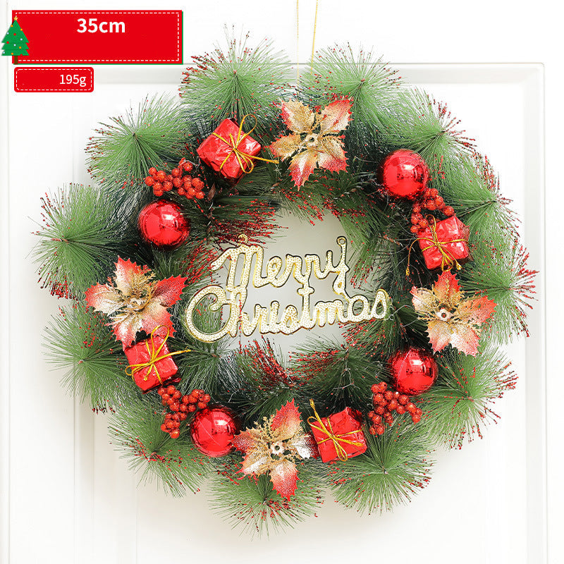 Christmas wreath with decorative elements and 'Merry Christmas' text on a white background