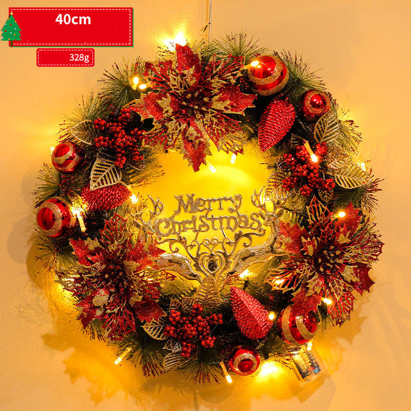 Decorative Christmas wreath with lights and ornaments on a yellow background
