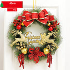 Christmas wreath with red ribbons, gold reindeer, and 'Christmas Greetings' sign on a white background.