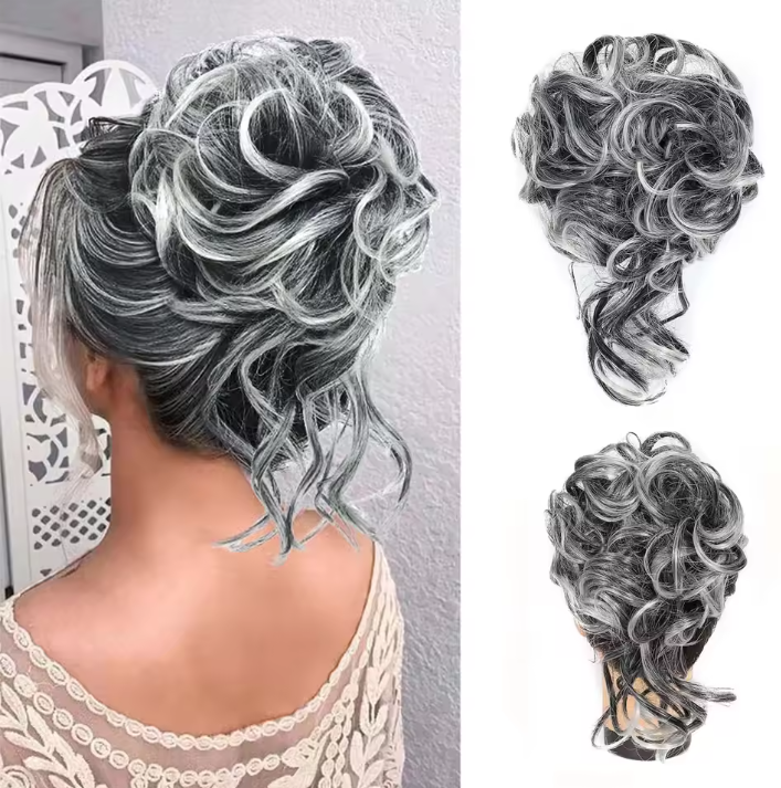 Gray and black curly hair extension styled on a person with a white lace top.