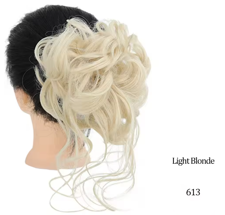 Light blonde hair extension on a mannequin head with 'Light Blonde' and '613' text.